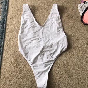 White high legged thong one piece